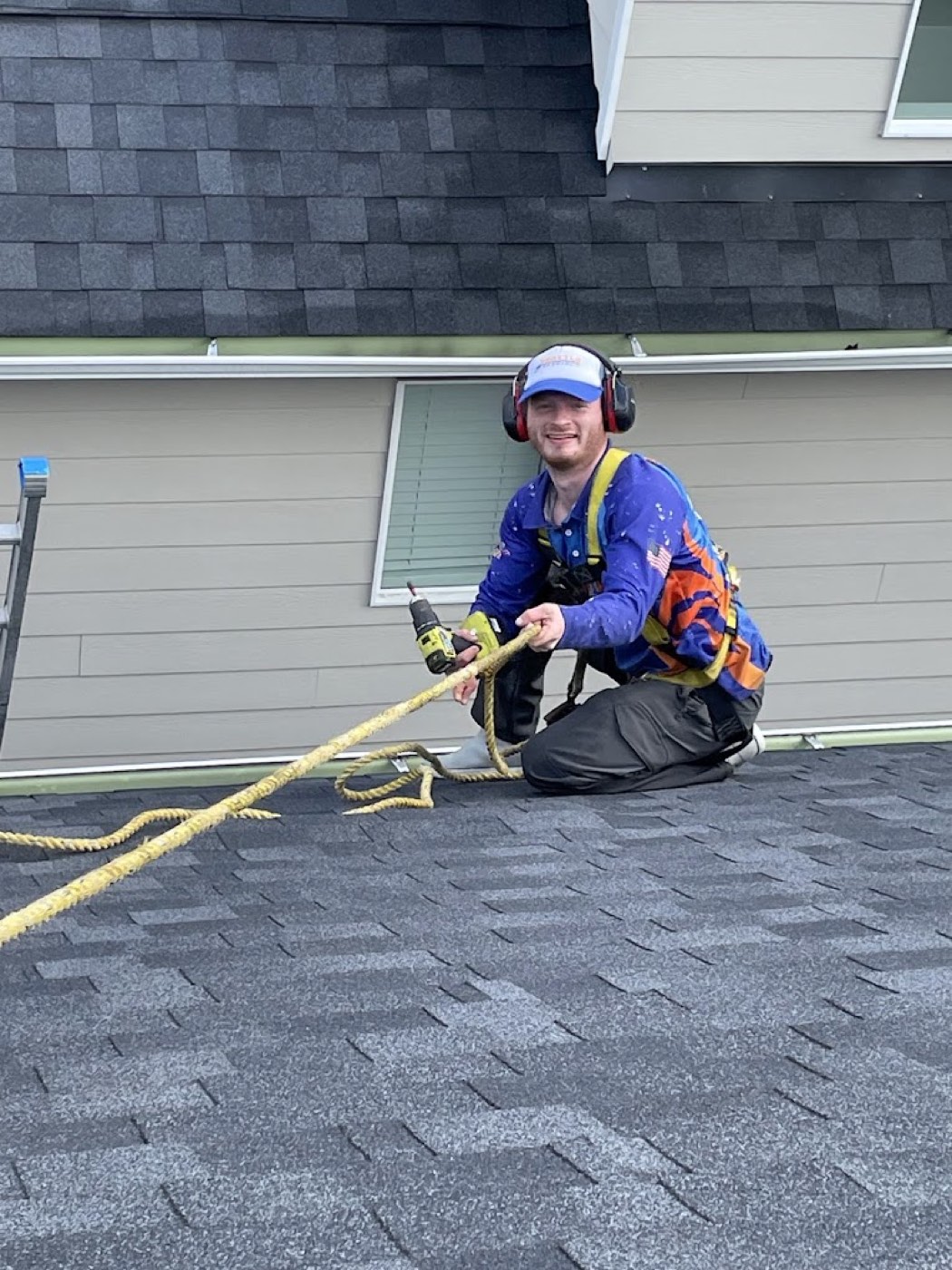 Dylan Thornsberry working on a roof cleaning project in the Seattle area
