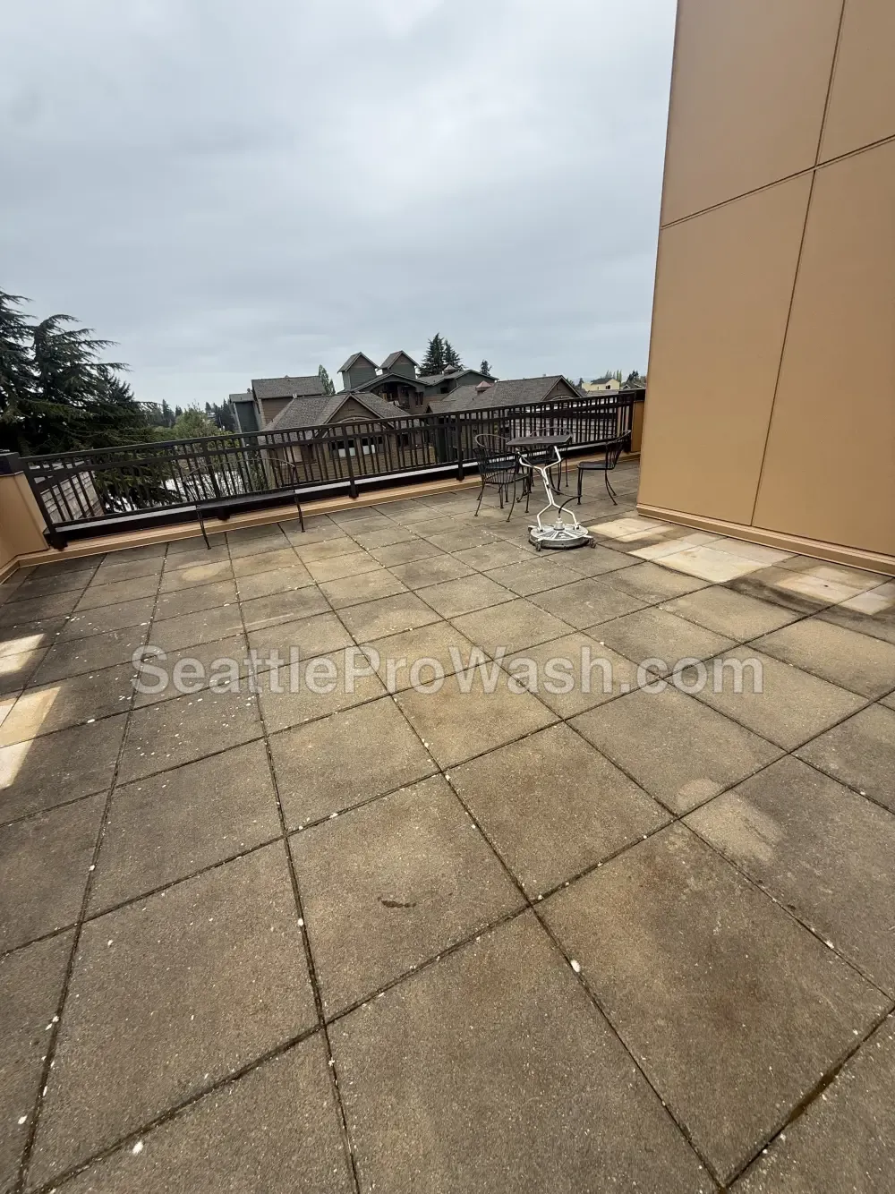 Concrete patio cleaning before and after in the Seattle area